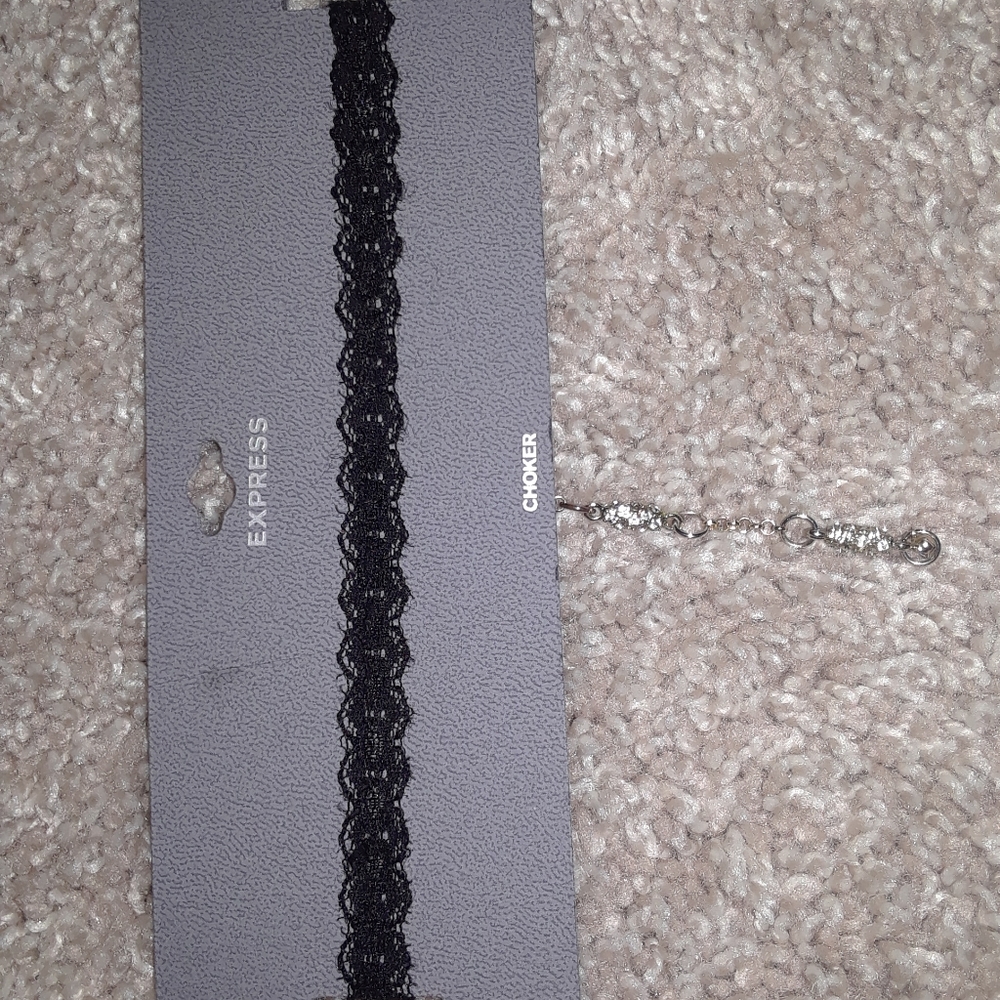 Worn black lace choker
